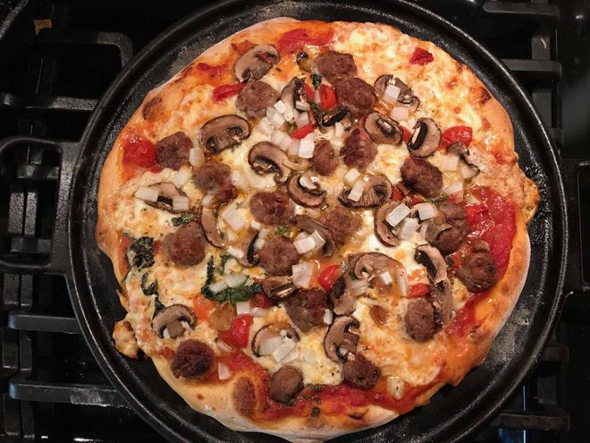 Home made pizza with sausage and mushroom