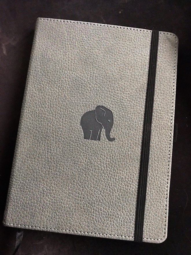 Photo of leather hardcover journal with elephant embossed on front